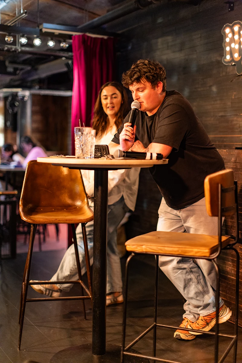 Book Club Scotland Quiz Host leading a quiz during a Book Club Scotland event.