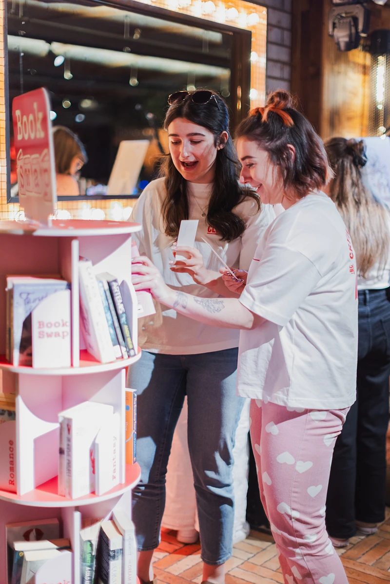 Book Swap at The Book Club Scotland Attendees browsing books at a Book Club Scotland book swap.
