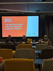Julie McNeill, Gaffer of The Hampden Collection and Poet in Residence at St Mirren FC; Donna Matthew, Makar for the Scottish Women’s National Team Poetry Society; and Hugh McMillan, Makar for the Scottish Men’s National Team Collection on stage at Paisley Book Festival