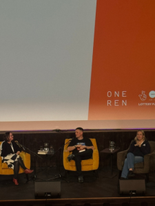Artist and performer Lorna Callery-Sithole, author Graeme Armstrong, and BSL interpreter Yvonne Strain on stage at Paisley Book Festival